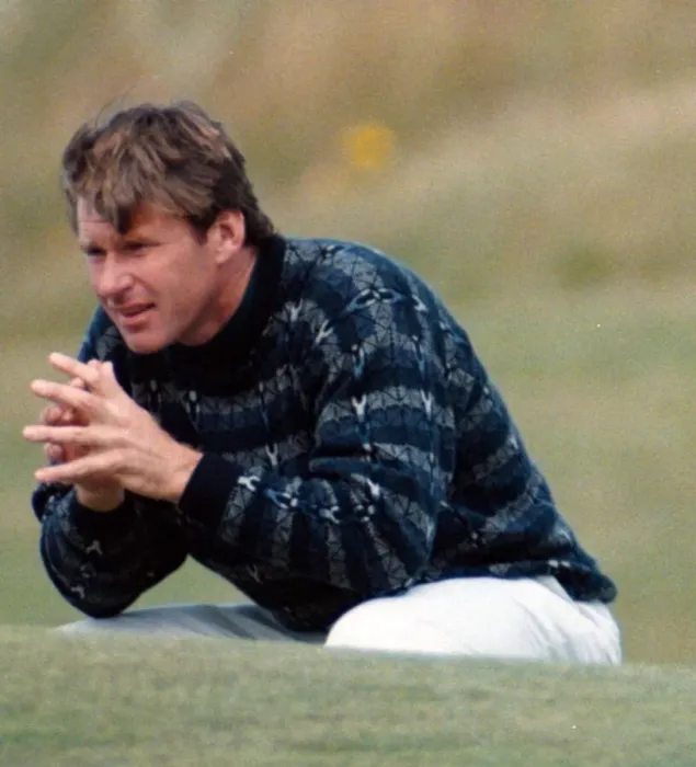 Framed Print : Nick Faldo at the British Open Golf Championship 1995, squats on the 16th green at St