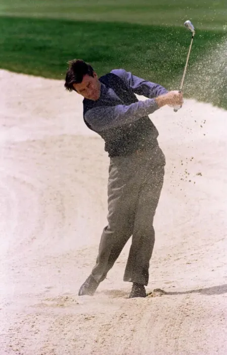 Framed Print : Nick Faldo Golf drives out of a fairway bunker during the Pro Am at The Oxfordshire Golf
