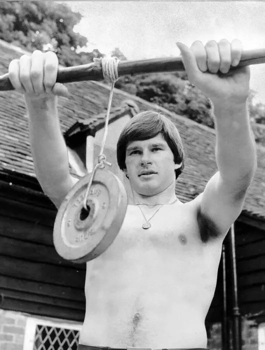 Framed Print : Nick Faldo Golf stands bare chested as he exercises his wrists by holding a weight Framed Print : Nick Faldo Golf stands bare chested as he exercises his wrists by holding a weight