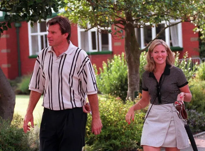 Framed Print : Nick Faldo Golfer with his girlfriend Brenna Cepelak by the clubhouse after his second Framed Print : Nick Faldo Golfer with his girlfriend Brenna Cepelak by the clubhouse after his second