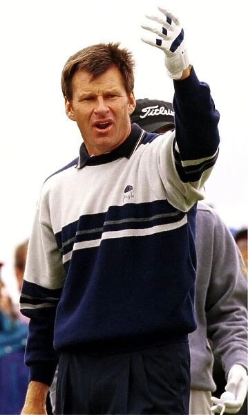 Nick Faldo upset at hitting a poor tee shot during the third round of the Open Golf
