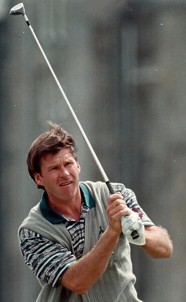 Nick Faldo watching his ball fly down the fairway at the British Golf Open Championship