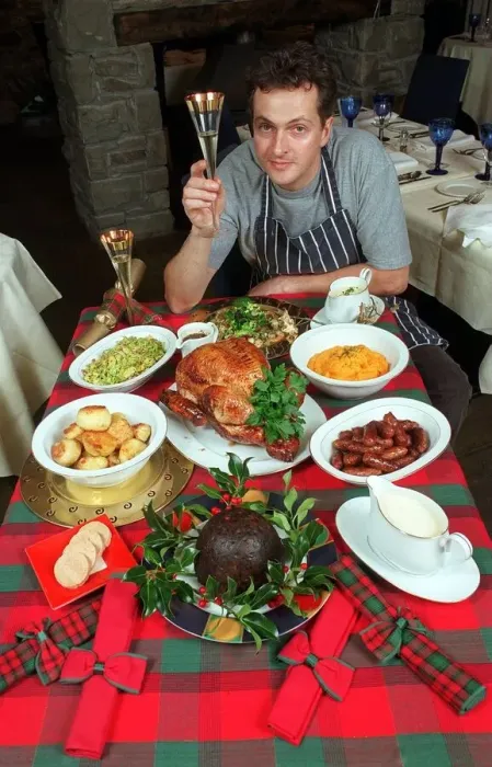Framed Print : Nick Nairn television chef with Christmas Meal and a glass of wine circa 1998