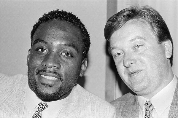 Nigel Benn with manager Frank Warren ahead of his next fight against American Tim
