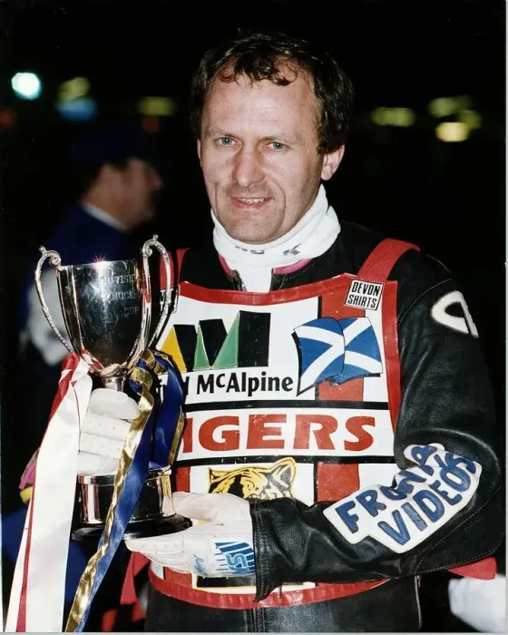 Framed Print : Nigel Crabtree stands holding the Phonesport KO Cup motorcycling speedway outdoors night