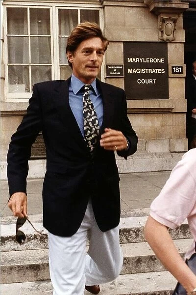 Nigel Havers actor leaving Marylebone Magistrates Court after being given a one year