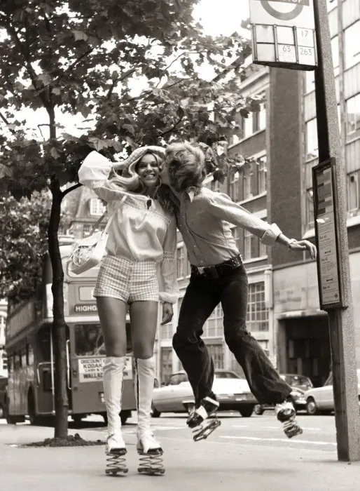 Framed Print : Nigel Lythgoe pictured in 1971 kissing Heather Berkers with springs on his shoes