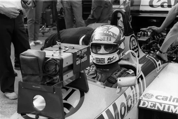 Framed Print : NIGEL MANSELL - BRITISH FORMULA ONE (F1) DRIVER IN HIS RACING CAR AT THE BRITISH GRAND