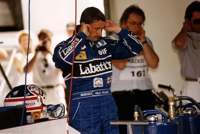 Framed Print : Nigel Mansell Motor Racing Driver Formula One F1 blocks his ears with his fingers while Framed Print : Nigel Mansell Motor Racing Driver Formula One F1 blocks his ears with his fingers while