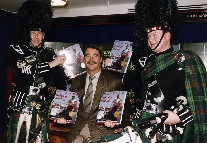 Framed Print : Nigel Mansell Motor Racing Driver Formula One F1 at Harrods for the signing of his book