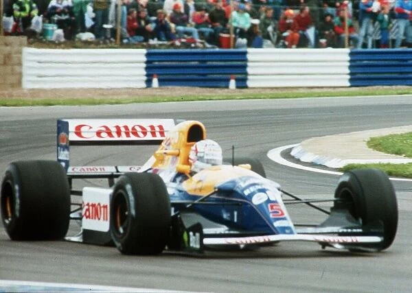 Nigel Mansell Motor Racing Formula One Grand Prix Driver driving his Williams Renault car