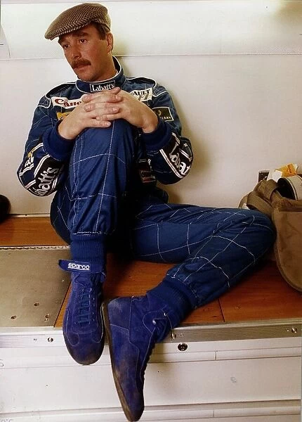 Nigel Mansell Motor Racing Grand Prix Formula One Driver sitting in his blue Williams