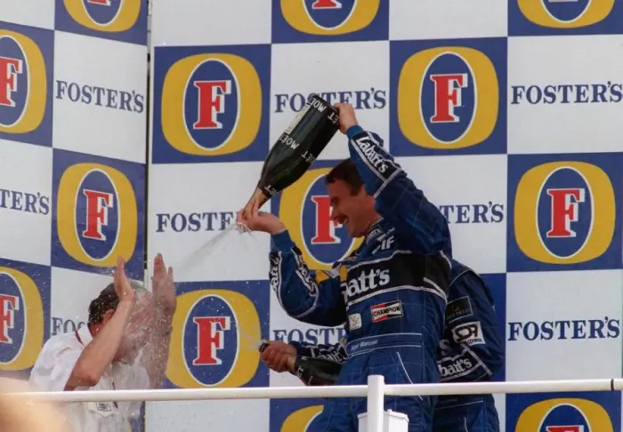 Framed Print : Nigel Mansell winning the British Grand Prix July 1992 Celebrating spraying other