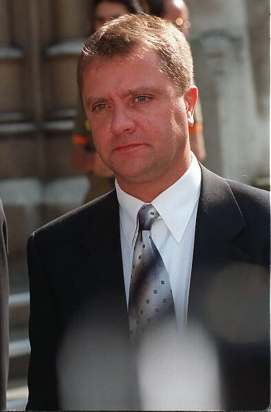 NIGEL MARTIN SMITH FORMER MANAGER OF ROBBIE WILLIAMS LEAVING THE HIGH COURT