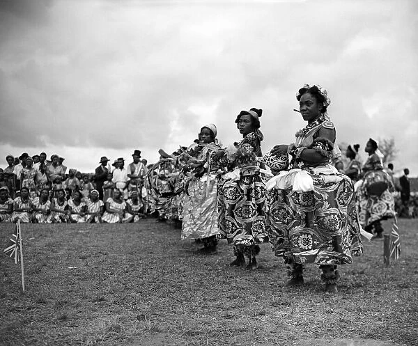 A Nigerian dancer from the Efik tribe stops at the end of a traditional dance for The