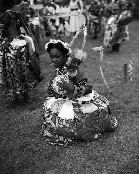 Framed Print : A Nigerian dancer from the Efik tribe stops at the end of a traditional dance for Framed Print : A Nigerian dancer from the Efik tribe stops at the end of a traditional dance for