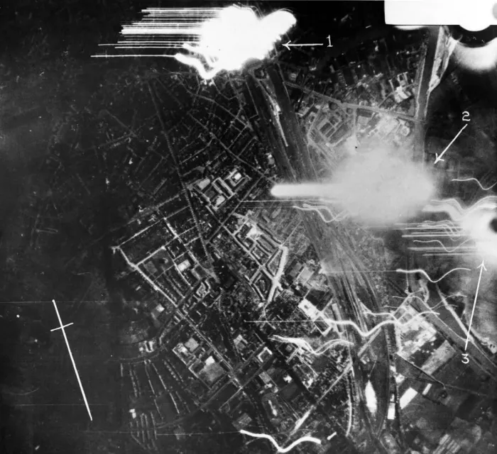 Framed Print : Night photograph taken from RAF bombers while making a heavy attack upon Munster