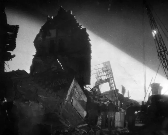 Framed Print : Night rescue by searchlight after a V Bomb in South England recently. December 1944