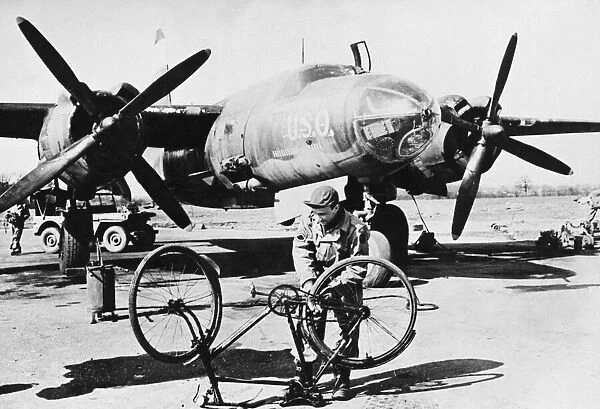 Ninth US Air Force mechanic with B-26 Marauder. May 26th 1944