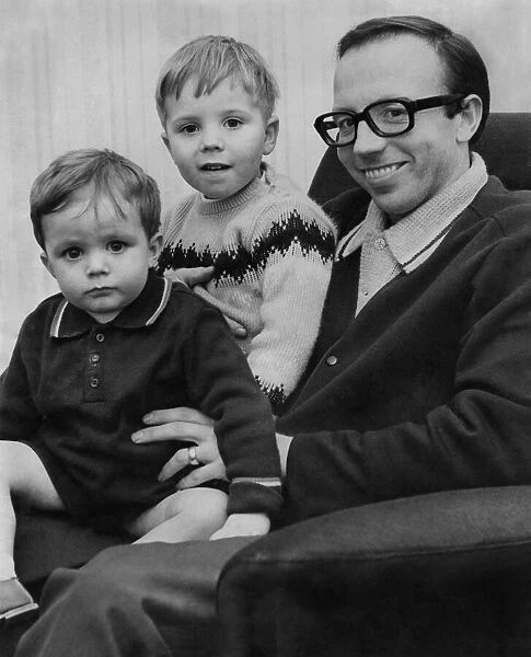 Nobby Stiles relaxing with sons Peter and John at home yesterday. February 1968 P011521