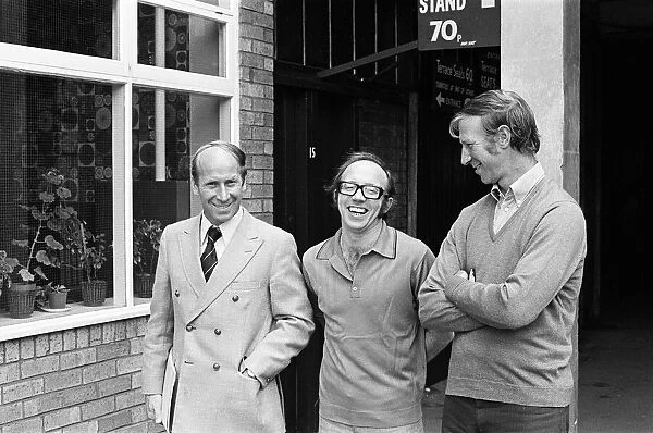 Nobby Stiles signs for Preston North End F. C. He is pictured with manager Bobby Charlton