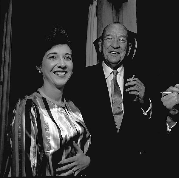 Noel Coward with actress Rosemary Martin at a special performance of his play '