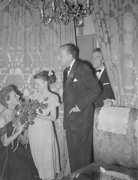 Noel Coward (Centre) seen here with Mary Martin left and Sammuel White at a Actors