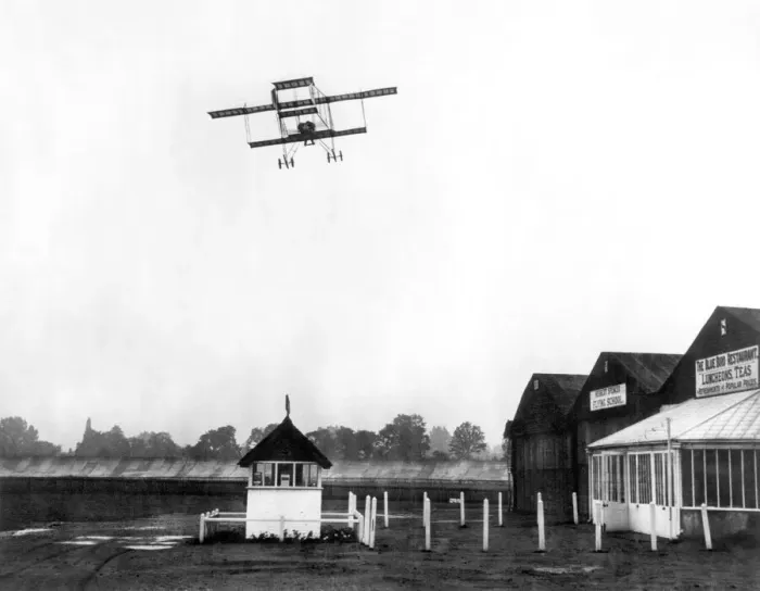 Framed Print : Noel Pemberton Billing flying over the hangars at Brooklands. September 1913 P001117 Framed Print : Noel Pemberton Billing flying over the hangars at Brooklands. September 1913 P001117