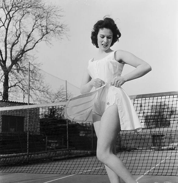 Norma Parnell (20) actress & model, wearing romper outfit which was designed by former