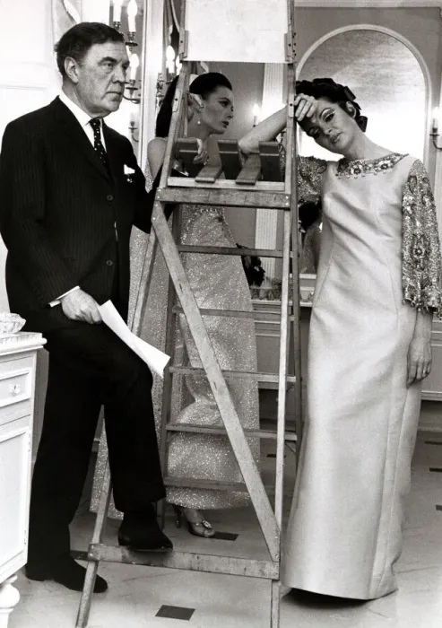 Framed Print : Norman Hatnell, Fashion Designer looking frustrated in his unfinished new hairdressing