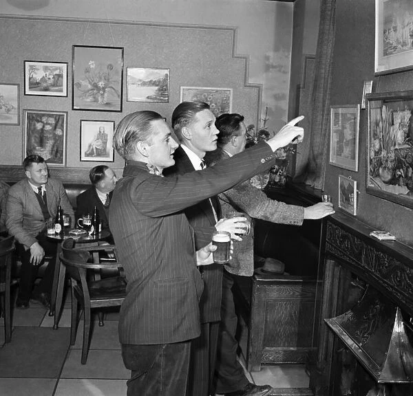 Norman Kenny of Sharston, Wythenshawe, discusses the finer points of art with some of