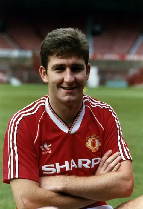 Framed Print : Norman Whiteside of Manchester United poses at Old Trafford. 12th January 1989