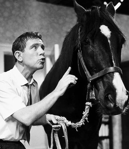 Norman Wisdom Comedian  /  Actor with Nellie the horse in the film '