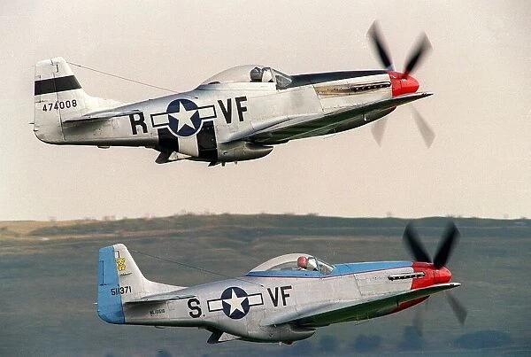North American Mustangs flying in formation at the Wroughton Airshow in 1993