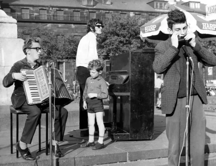 Framed Print : North East Festivals Crowds are treated to a musical treat by an amateur trio Framed Print : North East Festivals Crowds are treated to a musical treat by an amateur trio