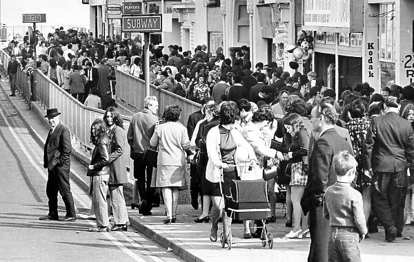 North holidaymakers enjoy the Easter sunshine, in 1980, on the seafront at Whitley Bay