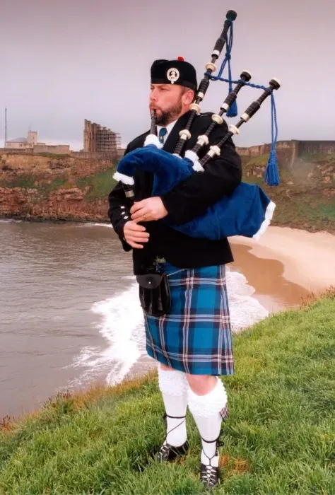 Framed Print : North Tyneside Pipe Band piper, Kevin Fraser sports the new tartan, designed for the band Framed Print : North Tyneside Pipe Band piper, Kevin Fraser sports the new tartan, designed for the band