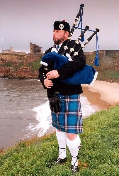 North Tyneside Pipe Band piper, Kevin Fraser sports the new tartan, designed for the band