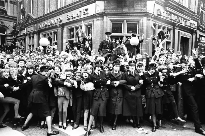 Framed Print : Northern Premier of A Hard Days Night'. Fans line up along the streets in Framed Print : Northern Premier of A Hard Days Night'. Fans line up along the streets in
