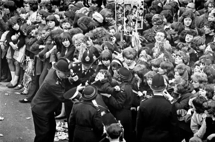 Framed Print : Northern Premier of A Hard Days Night'. Fans line up along the streets in Framed Print : Northern Premier of A Hard Days Night'. Fans line up along the streets in