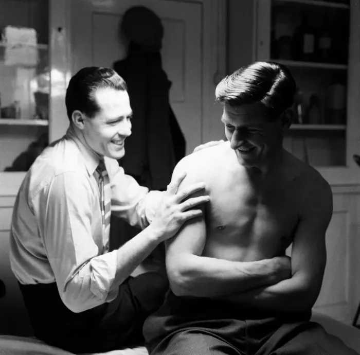 Framed Print : Norwich City FC players in dressing room. Injured keeper Ken Nethercott has his