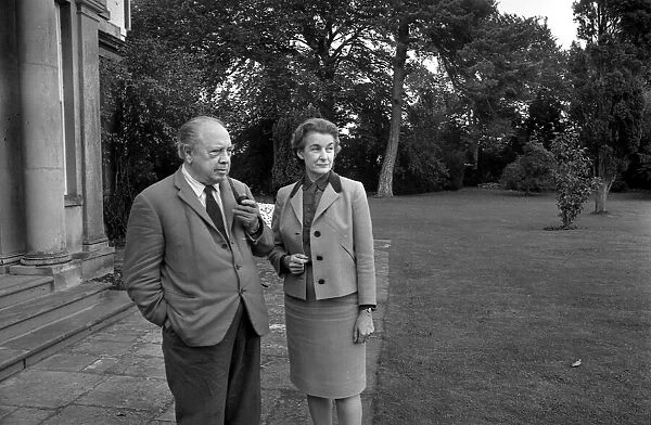 Novelist J. B. Priestley in the garden of his home with his wife Jacquetta Hawkes at