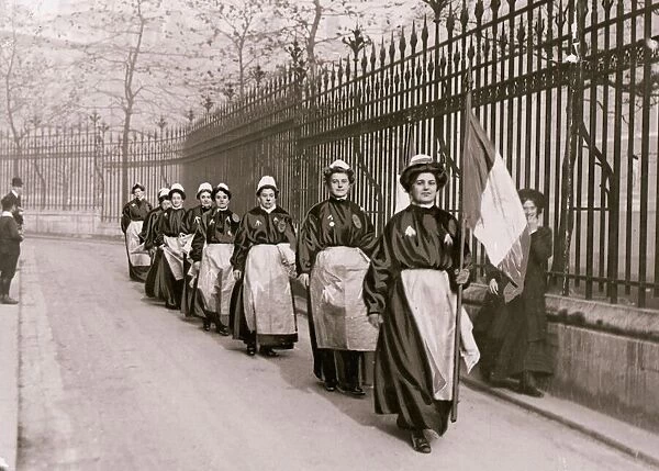 November 1908 Suffragettes in Prison Garb leave Clements Inn to advertise their upcoming