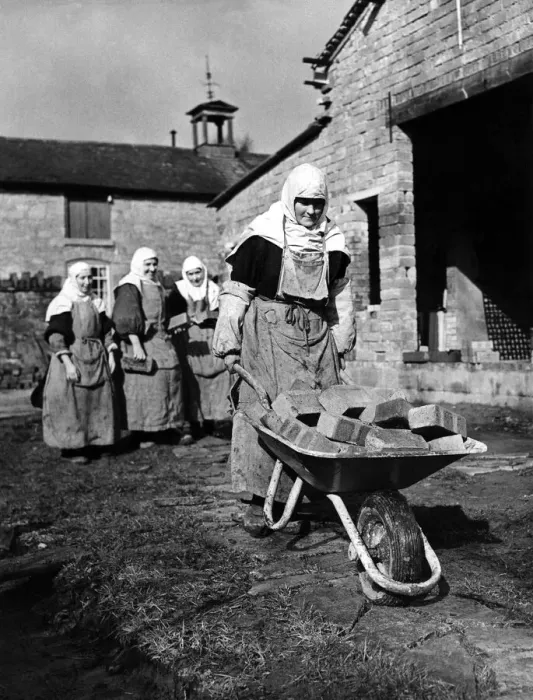 Framed Print : Nuns build a convent. Every moring 18 nuns don aprons over their habits