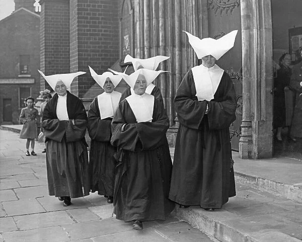 Nuns leaving St Chads Cathedral, Birmingham after a special service for the Pope