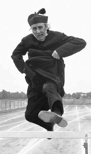 The Nuns Olympics. Spike Milligan dressed as a Roman Catholic priest seen here
