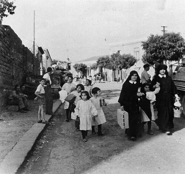 Nuns return to their convent after Allied victory, Sicily, Italy. Second World War