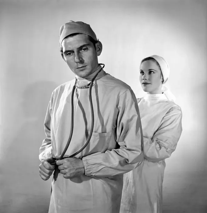 Framed Print : When in Nurse pulls in Love with a doctor'. Posed by models Framed Print : When in Nurse pulls in Love with a doctor'. Posed by models