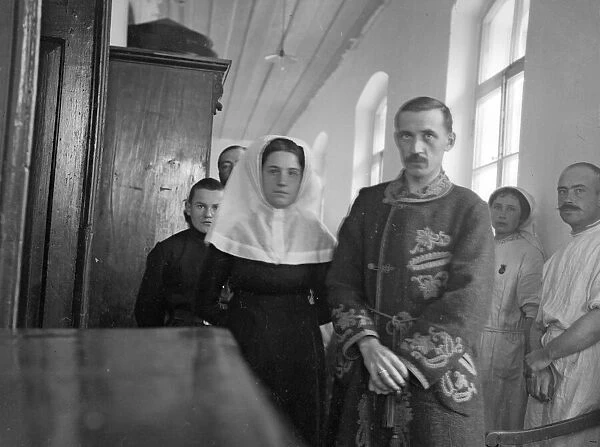 Nurse Timashenko with wounded officer who she carried from the firing line to a field