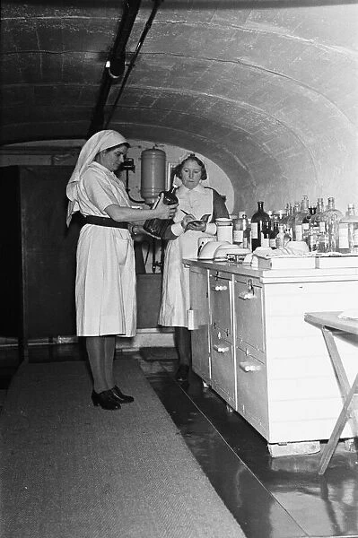 Nurses prepare the First Aid Post in Dover dug into the white cliffs. 22nd February 1945